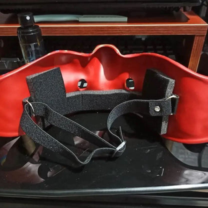 Adjustable straps on abstract red horned half-face mask